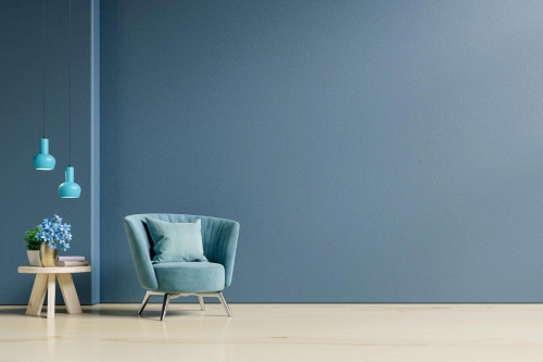 living room interior mockup warm tones with armchair empty dark blue wall background3d rendering 1